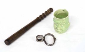 Early 20th century Police items to include wooden baton/night-stick, single Hiatt handcuff and