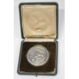 Cased Third Reich 1938 dated German dog hunting medal with scenes of stag hounds inscribed "