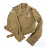 Battle dress blouse with parachute wings, medal ribbons for DSO, MC, GSM, blouse lacking label