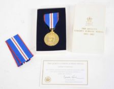 Cased Queen Elizabeth II Golden Jubilee medal, 1952-2002, with extra ribbon and certificate of