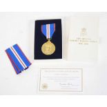 Cased Queen Elizabeth II Golden Jubilee medal, 1952-2002, with extra ribbon and certificate of