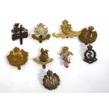 Quantity of nine 20th century British military cap badges to include Royal Flying Corps, Royal