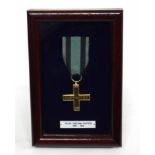 1939-45 Polish partisan fighter's medal in display case from Spink & Sons, London