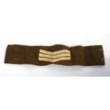 20th century British Army Sgt insignia armband upon battledress serge material (lacking buttons)