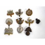 Quantity of ten military cap badges to include a Victorian King's Own Yorkshire Light Infantry bi-