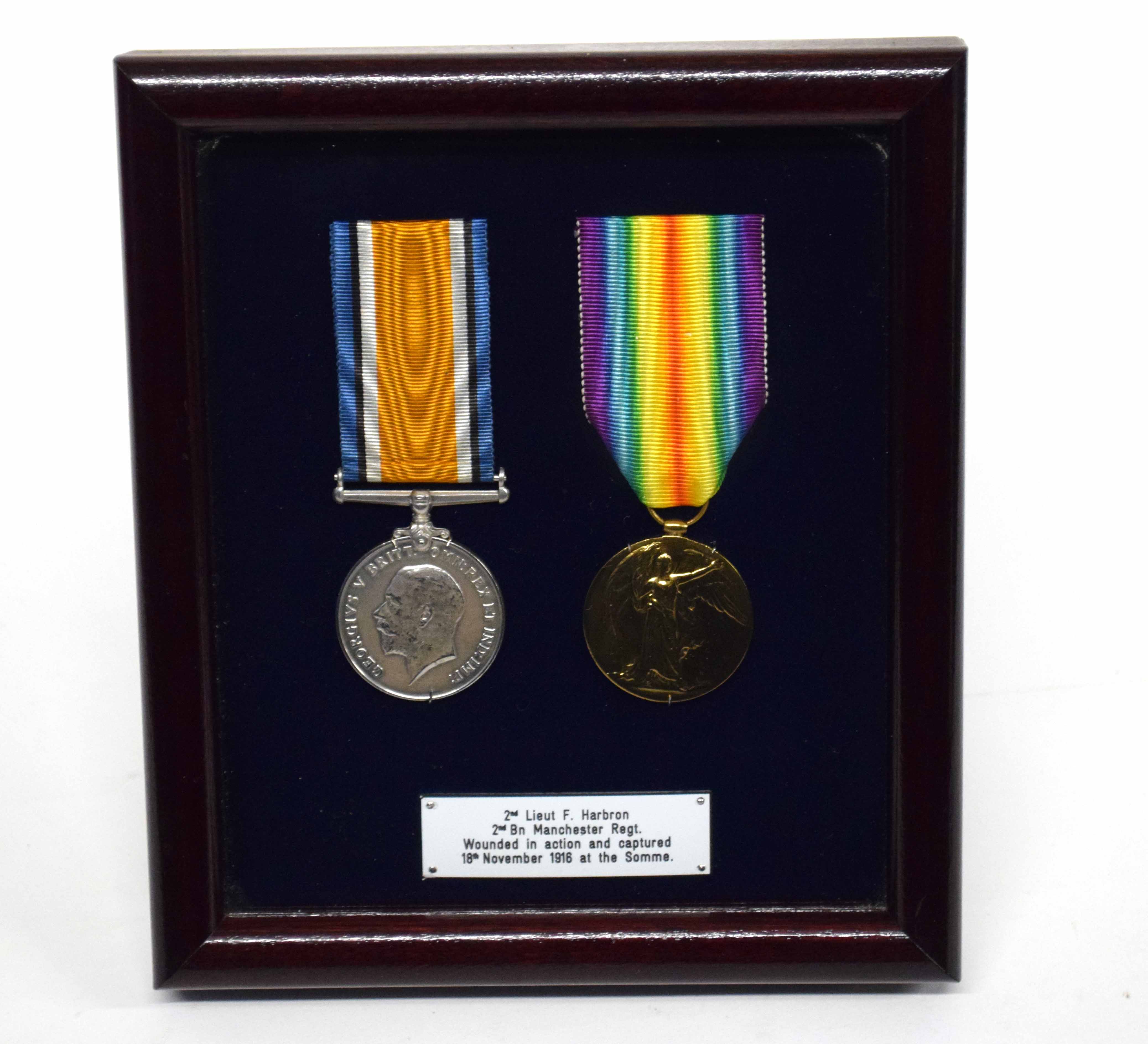 WWI medal pair impressed to 2nd Lieut Frank Harbron of 2nd Battalion 6th Company Manchester Regt