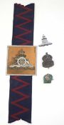 Small selection of insignia and badges to include painted insignia of Royal Artillery with flash