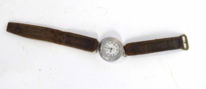 20th century OLMA dustproof wrist watch with leather strap, etching to reverse "SGN H.L. Daniel
