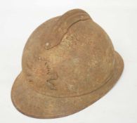 French M15 pattern Army helmet with Artillery badge to front and comb on top (a/f), heavily rusted