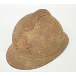 French M15 pattern Army helmet with Artillery badge to front and comb on top (a/f), heavily rusted