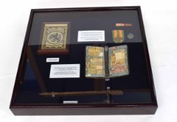 WWII display case with items from German occupied Holland to include civilian ration coupon
