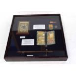 WWII display case with items from German occupied Holland to include civilian ration coupon