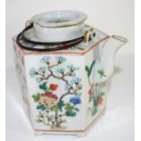 Oriental porcelain kettle decorated in polychrome with flowers, 19th century, 16cm high