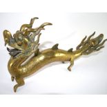 Large brass model of a Chinese dragon, 36cm long