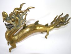 Large brass model of a Chinese dragon, 36cm long