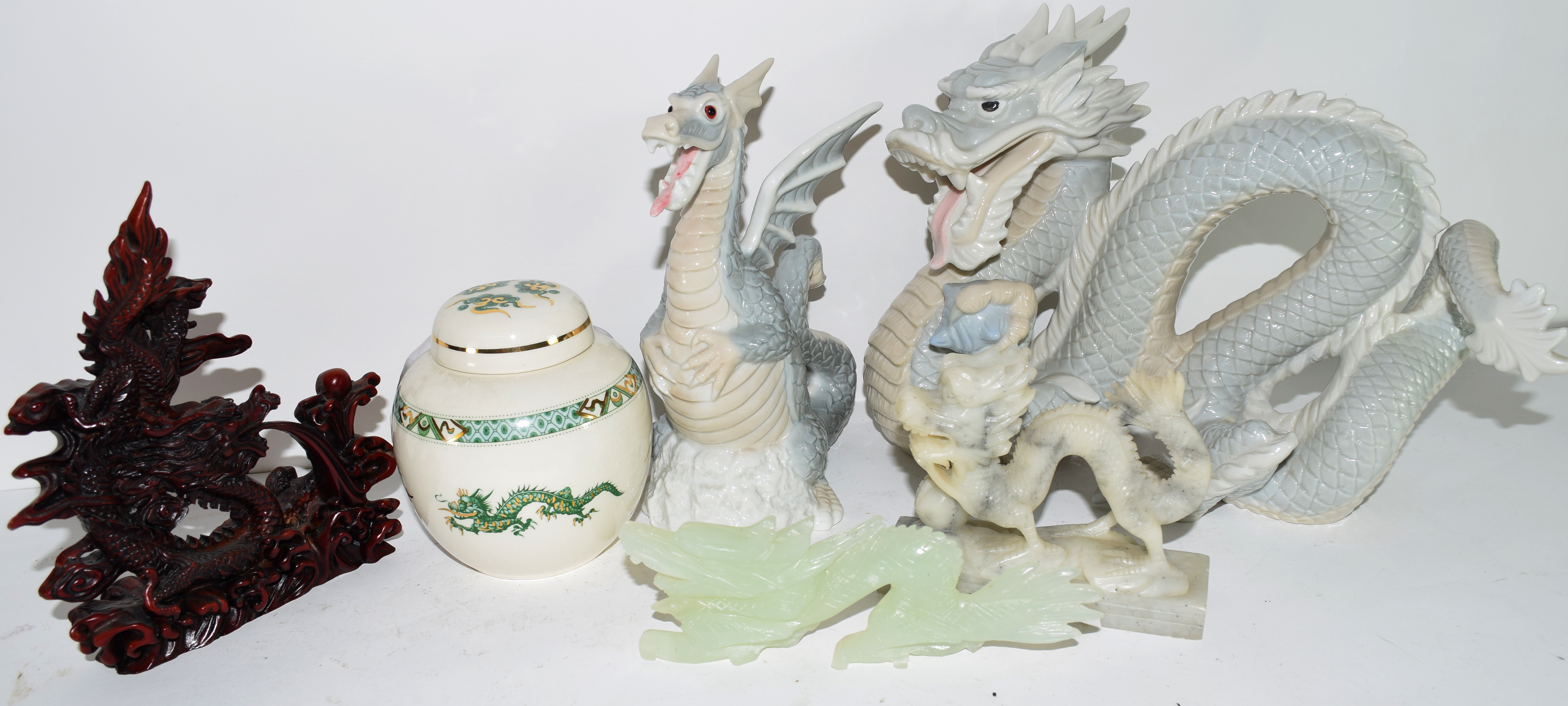 Miscellaneous lot of ceramics including two sculptures of dragons, a jadeite figure of a dragon,