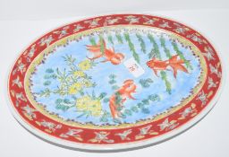 Chinese porcelain oval dish decorated with goldfish, 35cm long