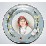 Victorian plate with a hand painted decoration of a young gipsy girl, signed verso