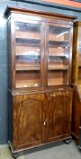 Early 20th century mahogany side cabinet with glazed bookcase above, width approx 104cm max
