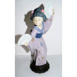 Lladro figure of an Oriental girl as a fan dancer on circular base, impressed 4991, 27cm high