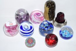 Quantity of paperweights including a Caithness moonflower example, Selkirk Glass example etc (10)