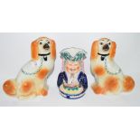 Two Staffordshire type dogs and further Staffordshire Toby jug (3)