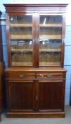 Full height mahogany side cabinet with glazed bookcase raised over double cupboard, width approx