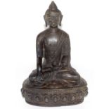 Bronzed metal figure of a Buddha in typical pose