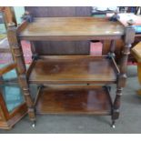 Early 20th century oak three tier trolley, length 88cm