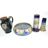 Group of Royal Doulton stonewares including a fruit bowl with tube lined floral decoration, jug with