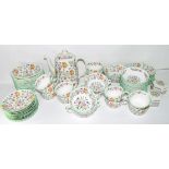 An extensive quantity of dinner and tea wares by Minton in the Haddon Hall pattern comprising 10