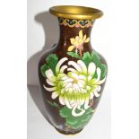 Cloisonne vase, the brown ground decorated with flowers in tones of green, 20cm high