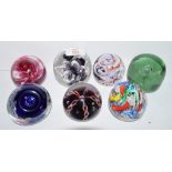 Quantity of paperweights including Caithness (2nd), a Grundvost 25 years example, Langham glass