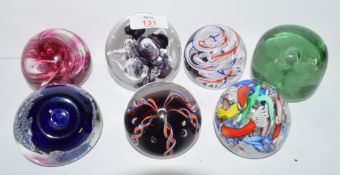 Quantity of paperweights including Caithness (2nd), a Grundvost 25 years example, Langham glass