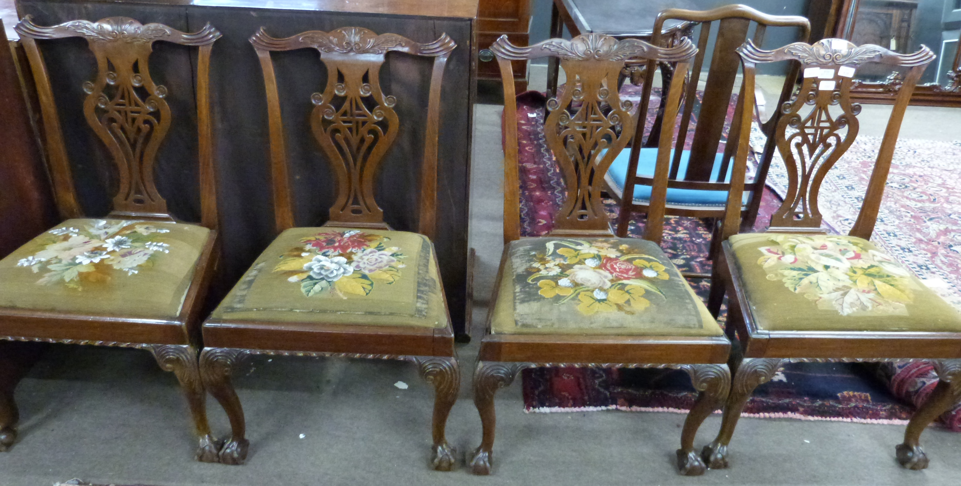 Set of 4 Chippendale style mahogany dining chairs, elaborate pierced splat backs, old tapestry