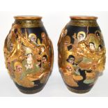 Pair of Satsuma vases, the black ground decorated with sages in gilt, together with dragons modelled