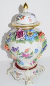 Continental porcelain vase and cover decorated in Meissen style with floral sprays with moulded