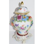 Continental porcelain vase and cover decorated in Meissen style with floral sprays with moulded