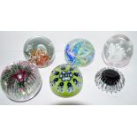 Group of paperweights including a Langham example signed by Paul Miller, Strathearn and a millefiori