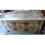 Carved oak coffer, length approx 108cm