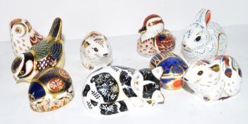 Group of Royal Crown Derby gold stopper paperweights including a bank vole, a rabbit, a sleeping