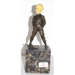 Reproduction Art Deco figure of a skier on onyx or marble base, the head modelled in resin, 30cm