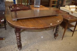 EARLY TO MID 20TH CENTURY OAK EXTENDING DINING TABLE WITH ADDITIONAL LEAF, RAISED ON HEAVY BARLEY