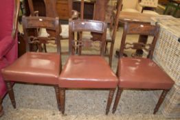 SET OF THREE LEATHER UPHOLSTERED DINING CHAIRS