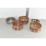 FIVE VARIOUS PLATED WINE COASTERS
