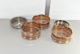 FIVE VARIOUS PLATED WINE COASTERS