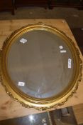 GILT FRAMED OVAL WALL MIRROR, APPROX 74 X 64CM