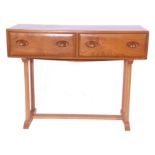 Circa 1960s Ercol style dressing table with two drawers