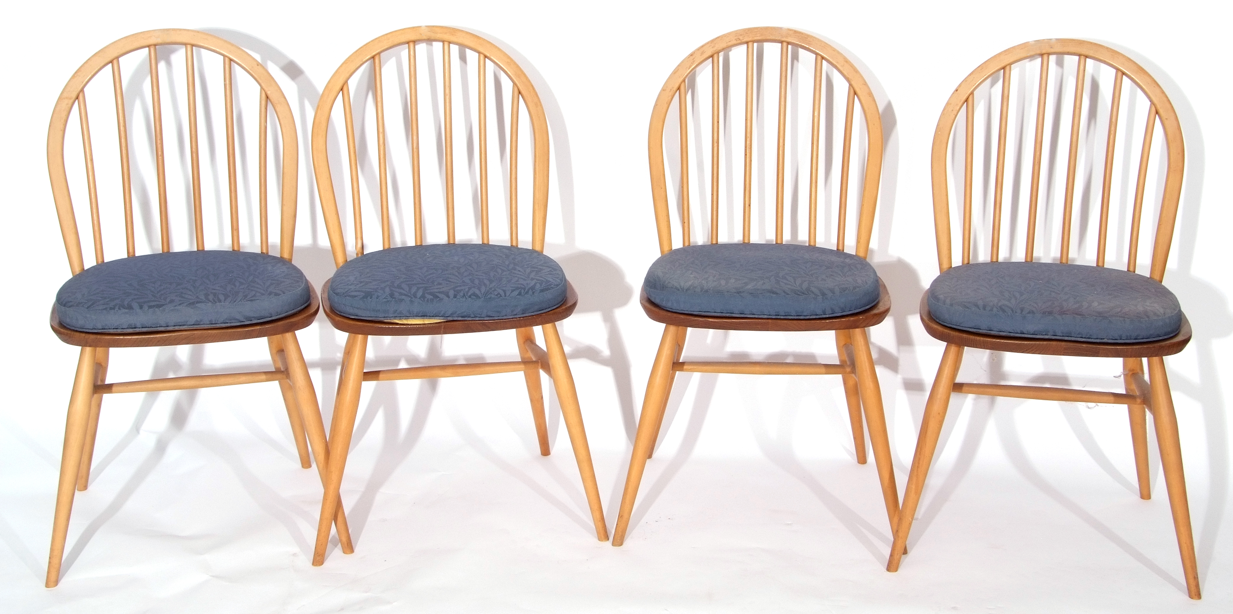 Set of four Ercol bentwood and stickback dining chairs