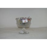 PEDESTAL BOWL CONTAINING GLASS SWEETS